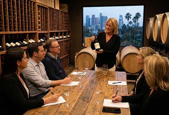 Lisa Dawes leading a wine education and cellar training session in Los Angeles